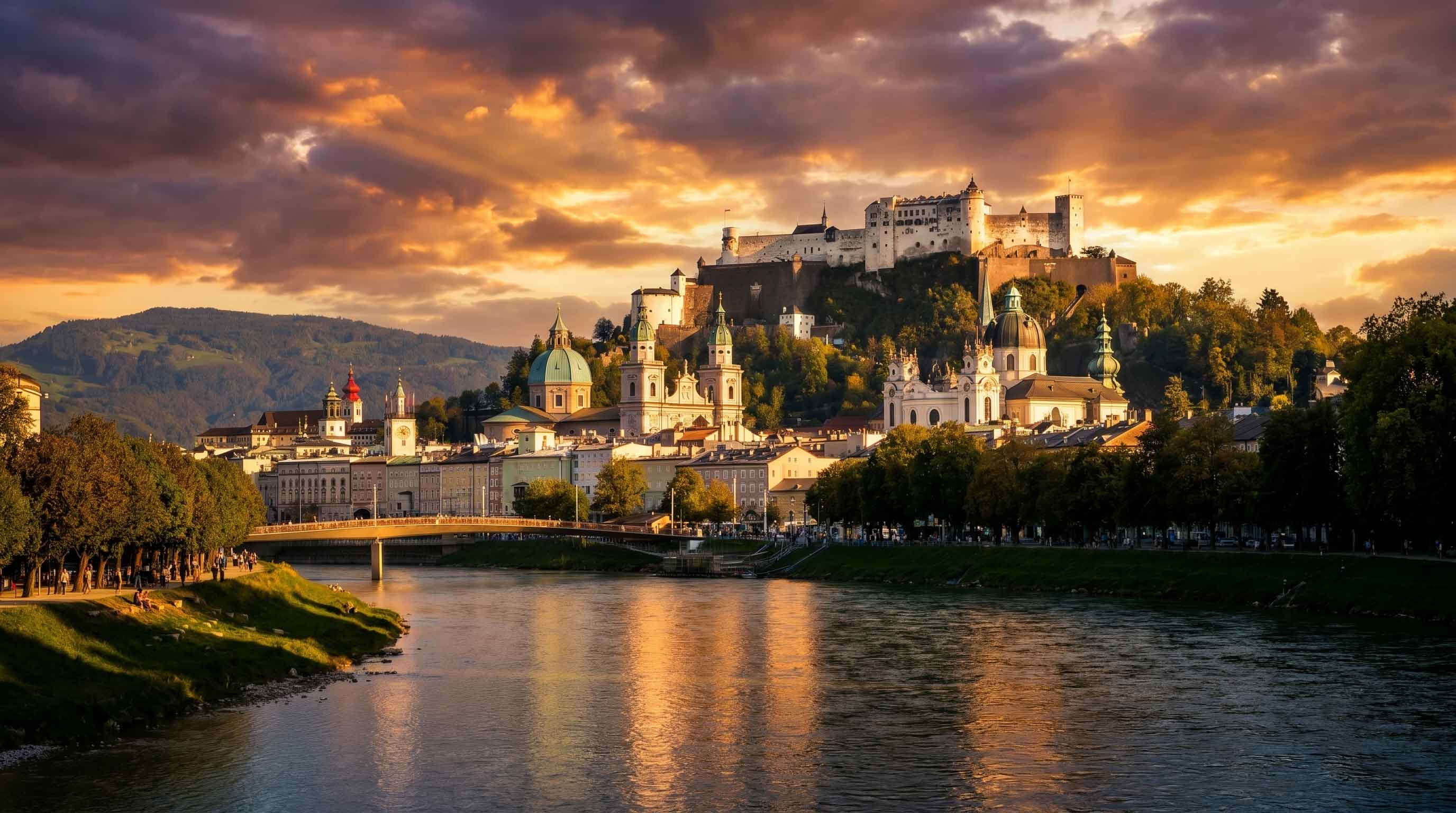 View across Salzburg's old town to Hohensalzburg Fortress, transfer to Hotel Schloss Mönchstein