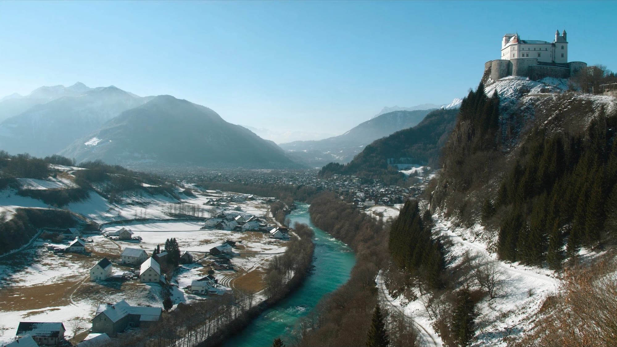 Snow-covered Inn valley near Kufstein on a clear winter day